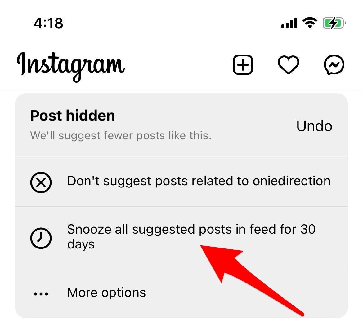 captura de pantalla de instagram flecha roja que apunta a la opción ocultar publicación en el feed durante 30 días