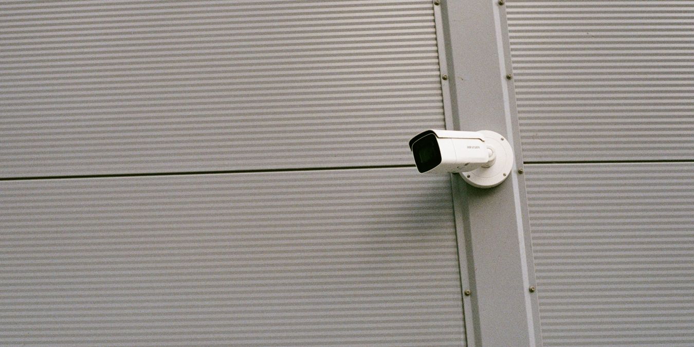 Outdoor Camera Attached On Wall Feature Image