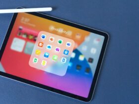 iPad Air with Apple Pencil on a blue background